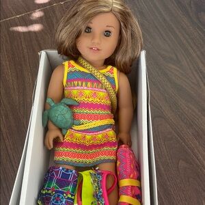 American Girl Doll with Vibrant Pink and Yellow Outfit